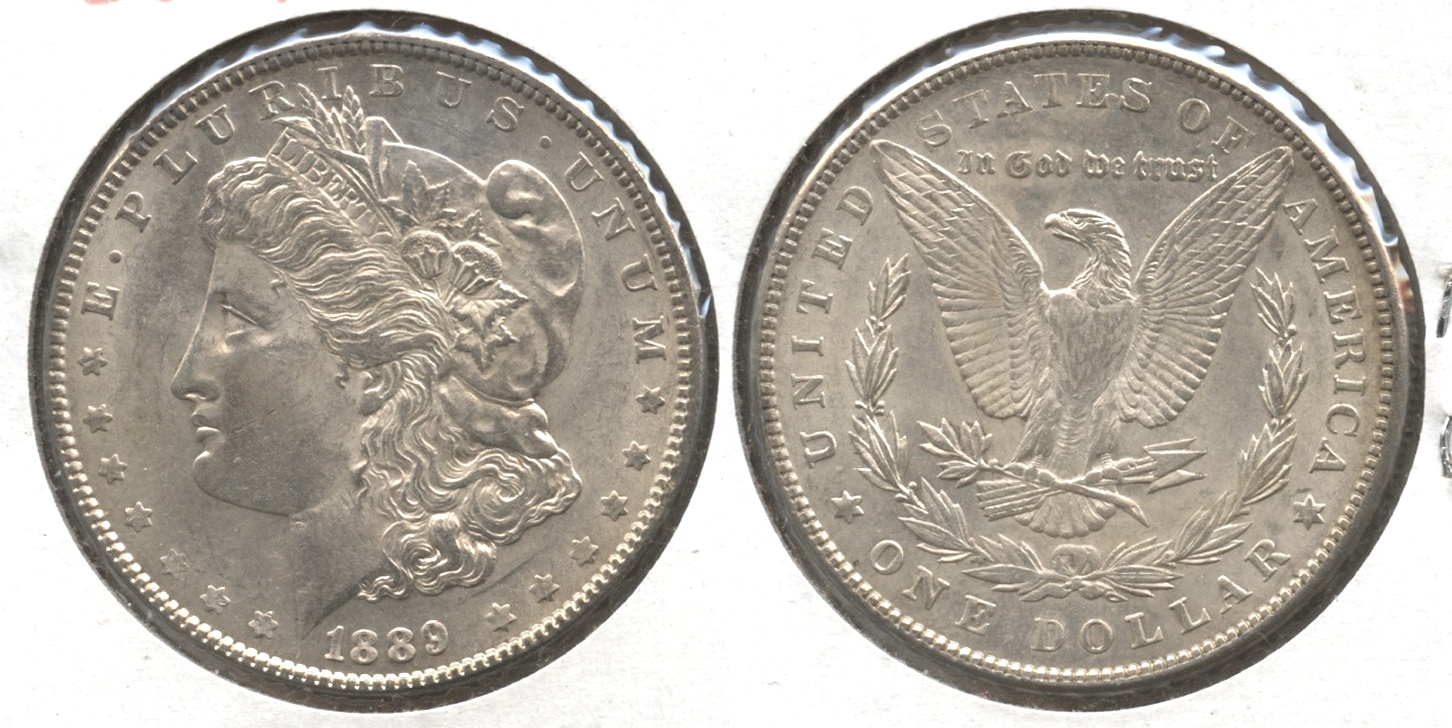 The 1889 Morgan Silver Dollar AU-50 #bc