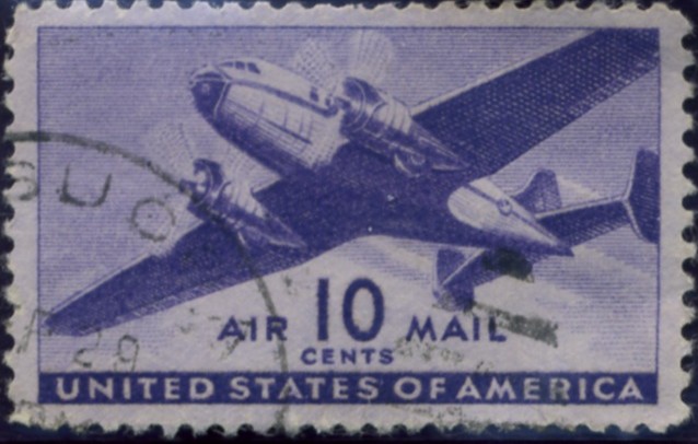 Scott C27 Violet Transport Plane 10 Cent Airmail Stamp